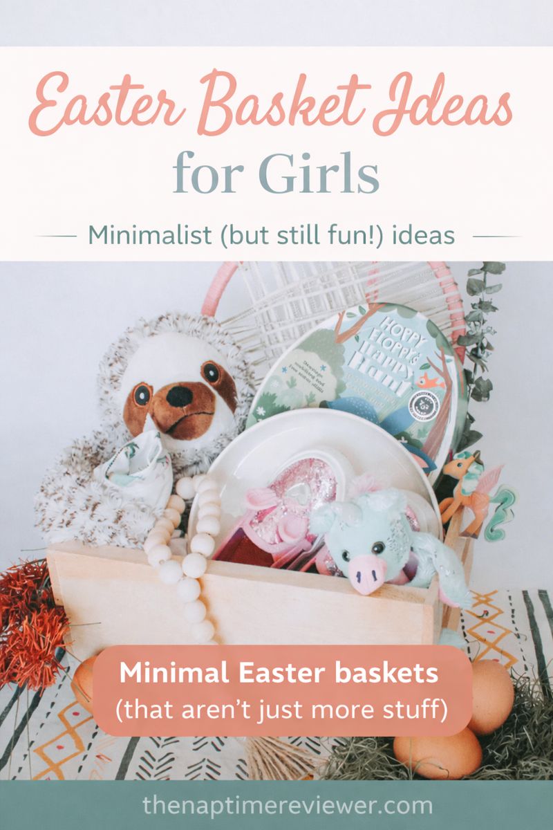 Minimalist Easter basket for girls featuring a wooden crate filled with a plush sloth, children’s Easter book, small toys, decor items, and soft neutral spring colors.