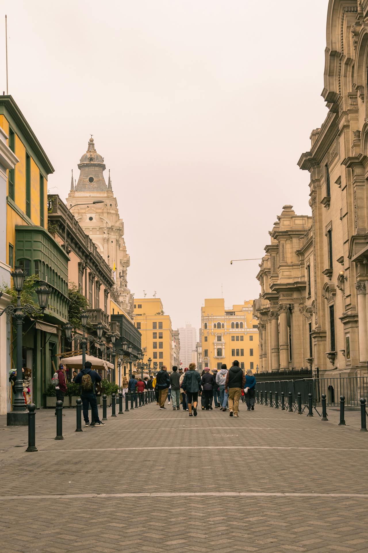 People walking down a street in a peru city
