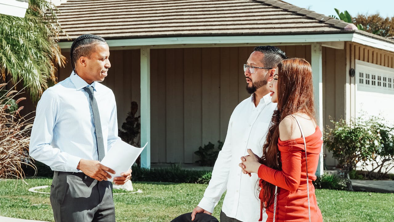 People Talking to a Realtor