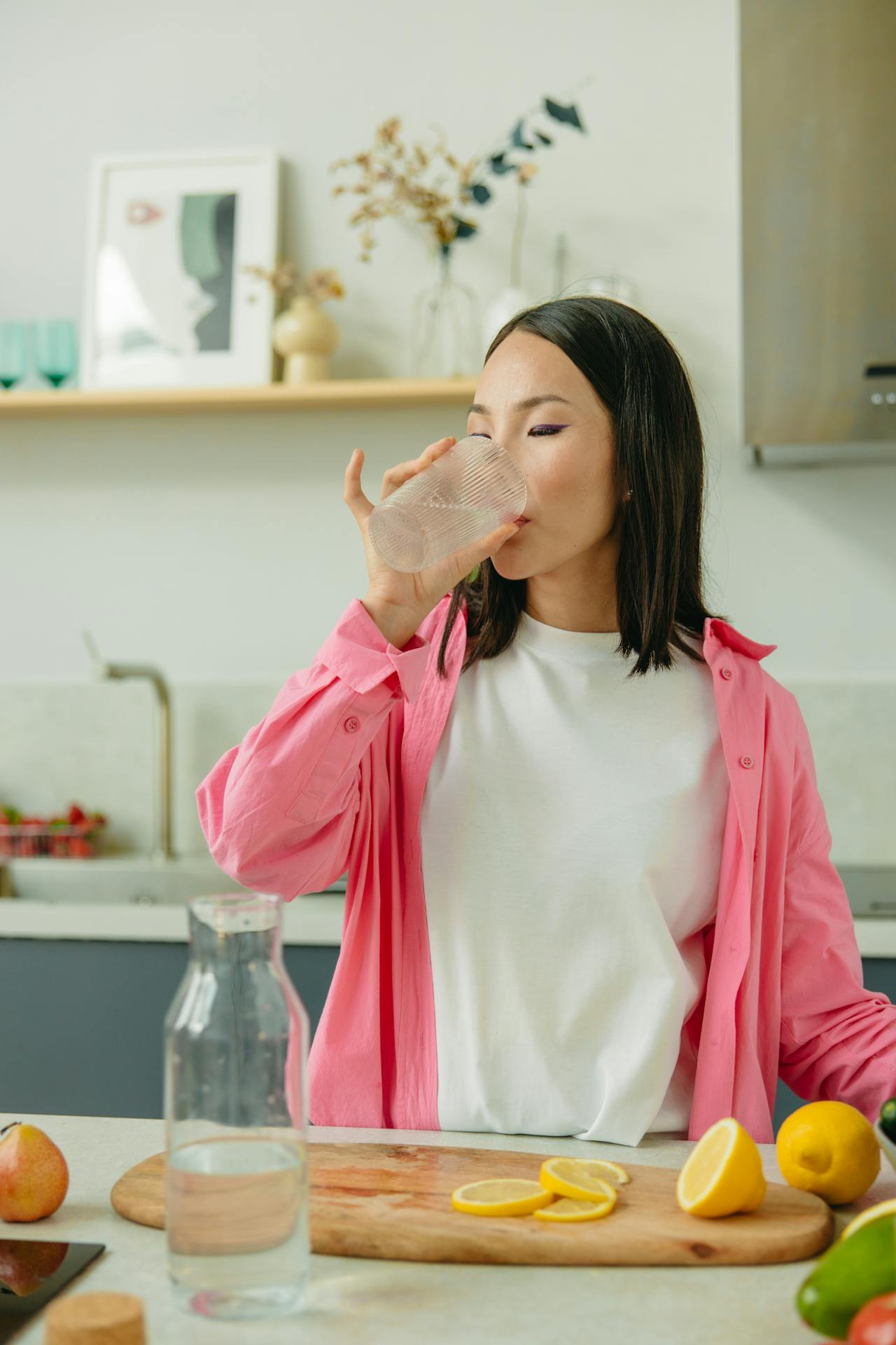 Drinking water in the kitchen