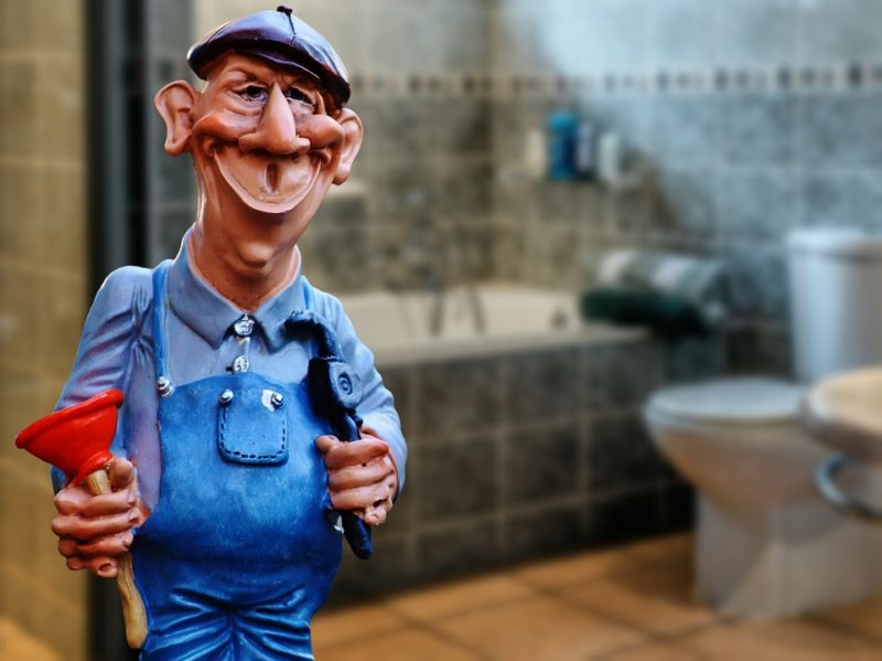 Toy plumber in bathroom