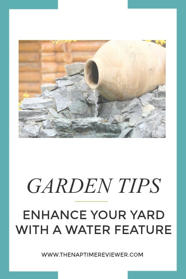 Decorative garden waterfall made with stone jar