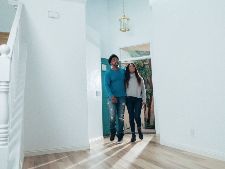 People Looking at a House
