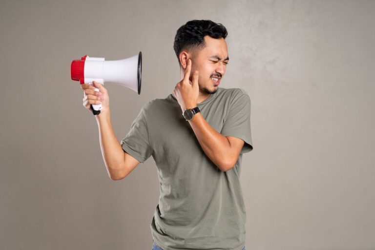 A Man Holding a Megaphone