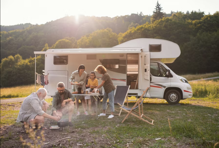 Family picnic next to RV